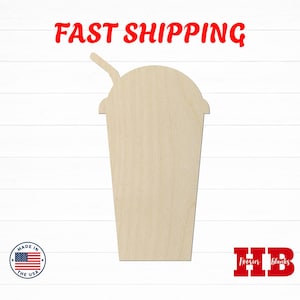 May include: A light-colored, flat wooden cutout in the shape of a cup with a domed lid and a straw extending from the top. The surface is smooth and unfinished, displaying the natural grain of the wood in a simple, symmetrical silhouette.