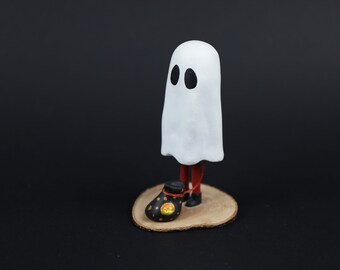 Kid with Ghost Costume and a Pumpkin Bag Sculpture - Halloween Gifts