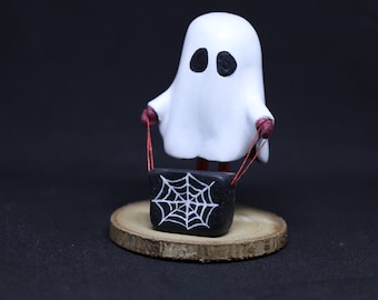 Kid with Ghost Costume and a Spider Web Bag Sculpture - Halloween Gifts