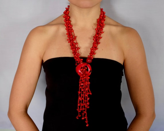 Chunky red store bead necklace