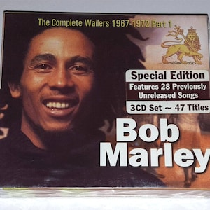 May include: A Bob Marley "Special Edition" 3CD set titled "The Complete Wailers 1967-1972 Part 1." The album cover features a smiling portrait of Bob Marley and includes text indicating 28 previously unreleased songs.