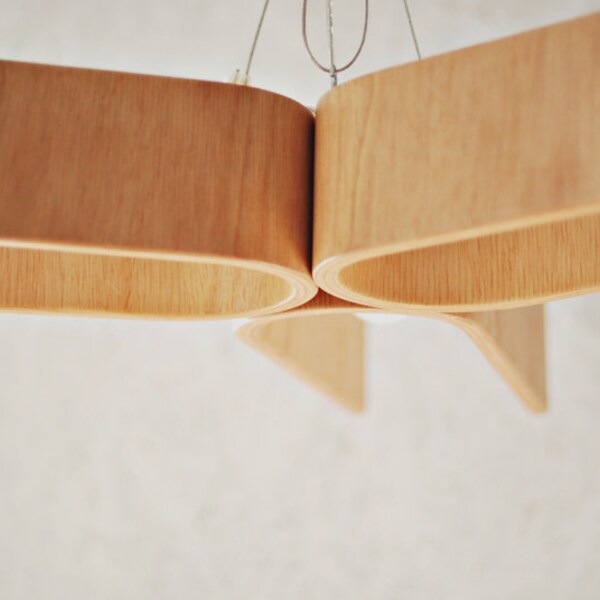 Hanging lamp from bent plywood