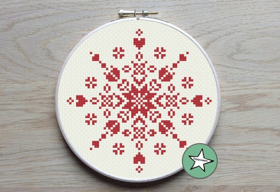 Cross-Stitch Snowflakes framed in double-sided ornament frames.  Cross  stitch, Cross stitch christmas stockings, Cross stitch kits