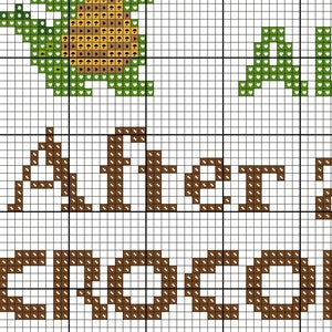 May include: Cross-stitch pattern featuring a green pineapple with brown leaves and the words "Aloha" and "Greetings" in brown letters.