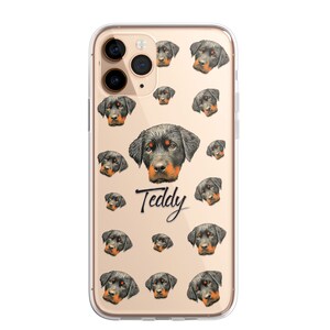 May include: A clear phone case with a pattern of Rottweiler dog faces. The case has a gold background and the name "Teddy" is written in black cursive.