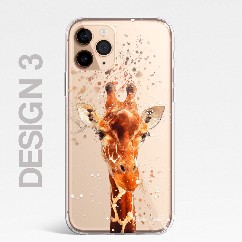 May include: A clear phone case with a watercolor-style illustration of a giraffe's head against a gold background with white splatters. The case has a cutout for the phone's camera.