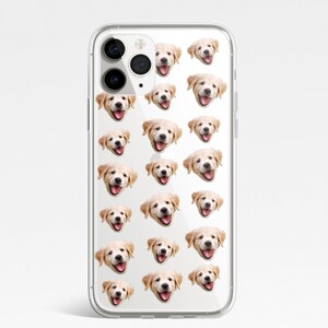 May include: A clear phone case with a repeating pattern of a golden retriever puppy's face.