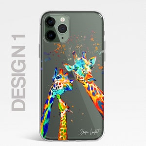 May include: A clear phone case with a colorful abstract painting of two giraffes. The giraffes are painted in shades of blue, green, yellow, orange, and red. The background is a dark gray with white paint splatters. The artist's signature, "Simon Lambert", is in the bottom right corner.