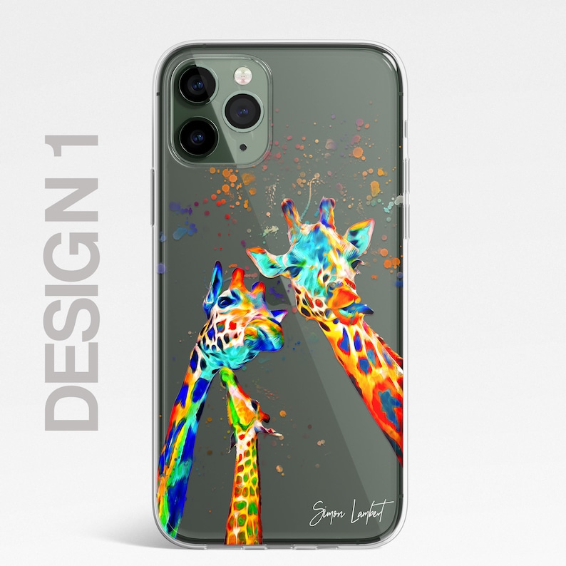 May include: A clear phone case with a colorful abstract painting of two giraffes. The giraffes are painted in shades of blue, green, yellow, orange, and red. The background is a dark gray with white paint splatters. The artist's signature, "Simon Lambert", is in the bottom right corner.
