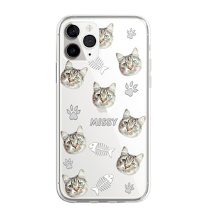May include: Clear phone case with a repeated pattern of a cat's face, a fish bone, and a paw print. The text "MISSY" is printed on the case.