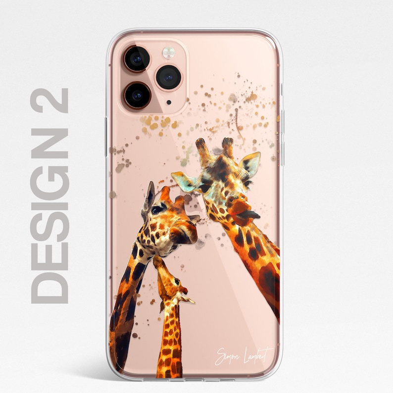 May include: A clear phone case with a watercolor design of three giraffes. The giraffes are painted in shades of brown, orange, and yellow. The background is a light pink with gold splatters.