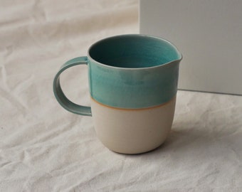 Artisanal enameled stoneware milk jug