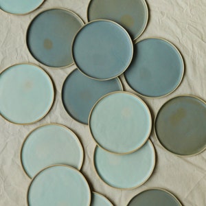 Flat blue dessert plate in artisanal ceramic