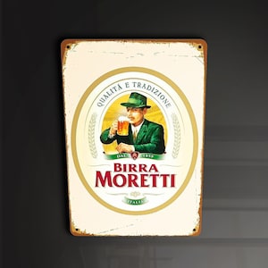 May include: A vintage-style metal sign featuring a man in a green hat and suit holding a glass of beer. The sign has the text "Qualita e Tradizione" and "Birra Moretti" in a circle with a green wreath. The sign also has the text "Dal 1859" and "Italia".