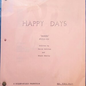 May include: A pink script for the television show "Happy Days" titled "Haunted." The script is dated September 24, 1974, and written by David Ketchum and Bruce Shelly. The script is in a plastic sleeve.