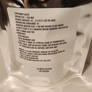 May include: White label with black text listing supplement facts for a tea bag. Serving size is 1 tea bag, package contents are 10 tea bags, and servings per container are 10. Suggested serving size is 1 tea bag placed in hot water. Allow to steep 3 to 5 minutes before drinking. Can also be used to make cold tea. Ingredients include dried mullein, dried raspberry leaf, and tea paper made of a special blend of thermoplastic fibres, abaca, and cellulosic fibres. All ingredients are all natural and non-GMO. Warning: If you are pregnant, nursing, or taking any medications, consult your healthcare professional before use. Keep out of direct sunlight. Store at room temperature. Report any adverse reaction: 931.300.2518. L/B MRT01/01121122 EXP 08/2024.