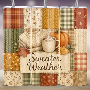 May include: A cylindrical tumbler featuring a patchwork design of autumn-themed patterns including plaid, floral, and cable knit textures. The center displays a folded beige sweater, a pumpkin, and a mug with the text Sweater Weather.
