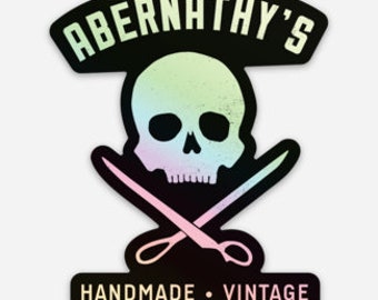 Abernathy's Holographic Skull and Scissors Sticker