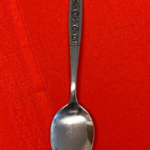1 Oneida northland floral panel stainless steel tablespoon