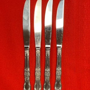 Set of 4 Oneida northland Carolina stainless steel dinner knifes