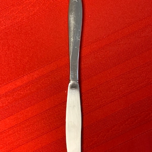 1 vintage retro atomic Oneida twin star stainless steel dinner knife