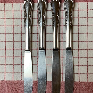 Set of 4 Simeon l George h Rogers Oneida homestead stainless dinner knives
