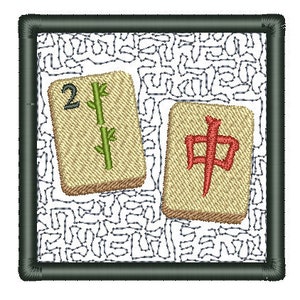 May include: Two Mahjong tiles with embroidered designs. One tile features the number 2 and a green bamboo stalk. The other tile displays a red Chinese character. The tiles are set against a white background with a black border.