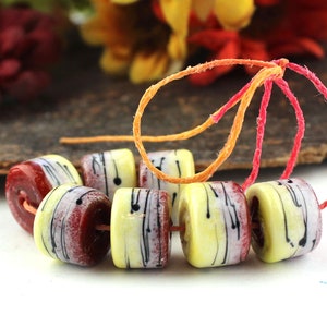 SRA Handmade lampwork beads red & yellow enameled rustic barrel drop rollo drops bead set