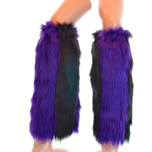 May include: Pair of leg warmers with a vibrant purple, black, and green faux fur design. The leg warmers are displayed on mannequin legs. The text "Fun Fan Clothing" and "Game Day Booties" is visible.