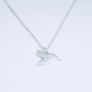 Sterling silver hummingbird pendant.