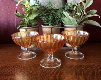 Beautiful (3) Carnival Marigold Footed Dessert Goblets. Dessert glassware. Irridescent orange / peach color. Mint cond. Vintage Condition