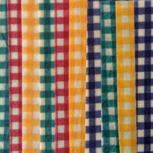 May include: A set of nine fabric strips with a gingham pattern in various colours, including blue, green, red, yellow, and white.