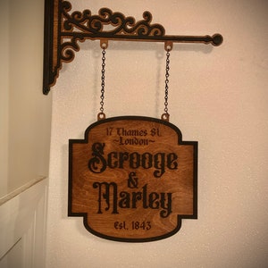 Scrooge & Marley two-sided hanging wall sign with bracket
