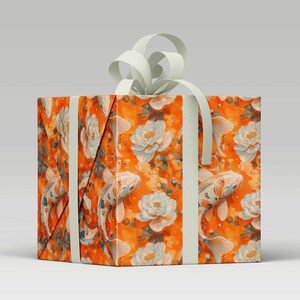 Orange and white koi swimming among peony flowers wrapping paper