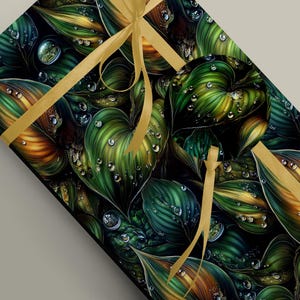May include: A gift wrapped in paper with a botanical design. The paper displays a pattern of green and gold leaves with water droplets. A gold ribbon and bow secure the package, creating an attractive presentation.