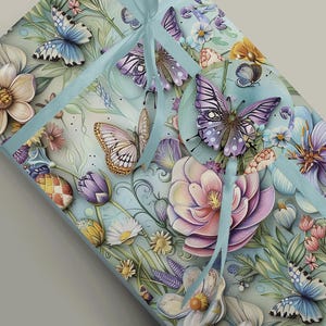 May include: A blue and green gift wrap with a floral pattern featuring butterflies, flowers, and leaves. The wrapping paper has a light blue background with a white ribbon.