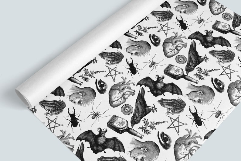 Monochrome witch craft artwork on wrapping paper roll