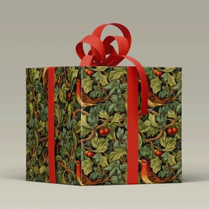 Holiday Wrapping Paper: Holly, Ivy, and Robin Pattern around a gift with a ribbon