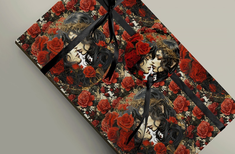 May include: A black and gold gift wrap with a repeating pattern of two women with long black hair kissing, surrounded by red roses and vines.