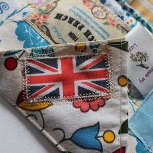 Full colour printed twill fabric labels featuring a union jack.