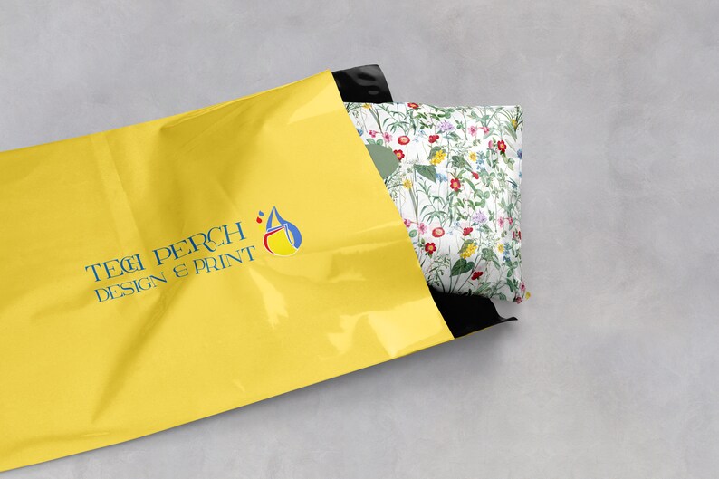 Wildflower tissue paper covering a gift being put into a yellow postage bag