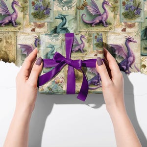 May include: A gift wrapped in paper with a dragon and floral design, tied with a purple ribbon. The paper has a vintage aesthetic with illustrations of dragons, flowers, and butterflies in various colours.
