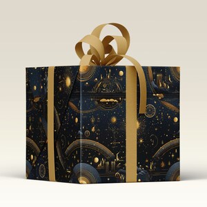 Moon phase and Zodiac Gift Wrapping Paper around a parcel with a Gold Ribbon