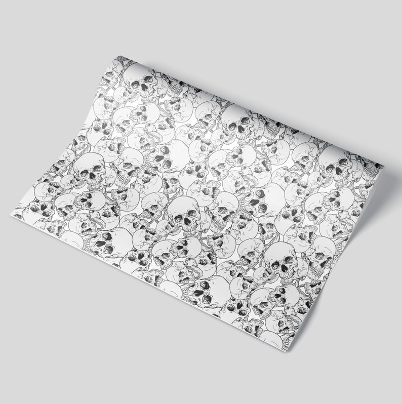 A sheet of wrapping paper featuring skulls