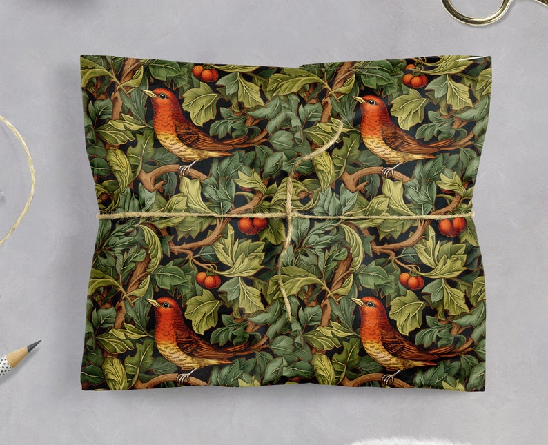 Holiday Wrapping Paper: Holly, Ivy, and Robin Pattern around a gift with twine to secure