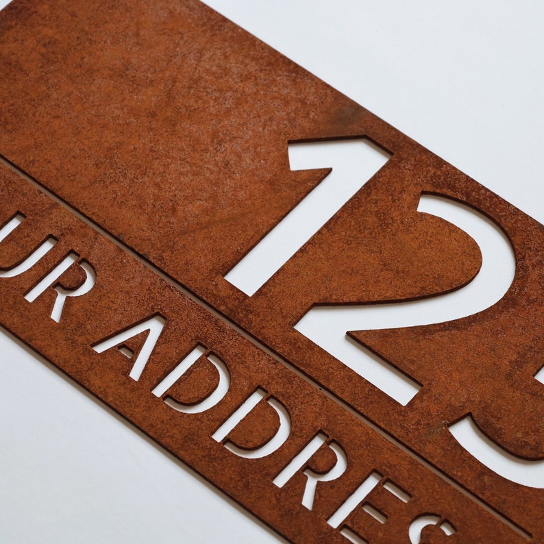 corten steel address signboard, rusted steel house number, rusted steel logo, corten steel logo