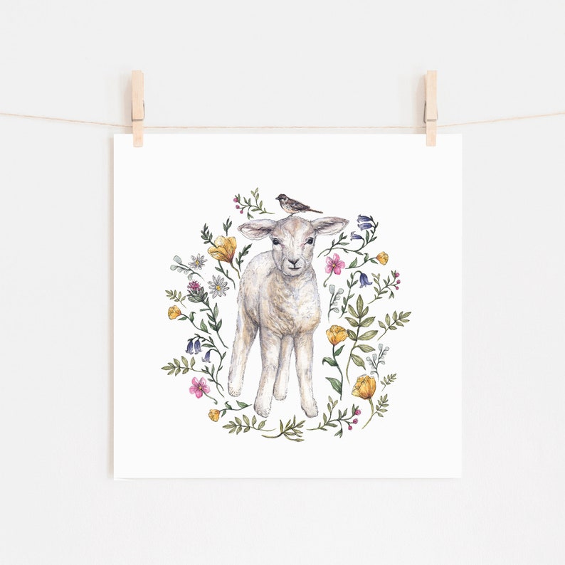 May include: A watercolor painting of a white lamb standing in a circle of colorful wildflowers. A small bird sits on the lamb's head.