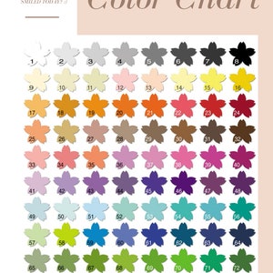 May include: Color chart with 72 different colors displayed in a grid of 8 columns and 9 rows. Each color is represented by a stylized cherry blossom flower. The colors range from white to black, with shades of pink, red, orange, yellow, green, blue, and purple.
