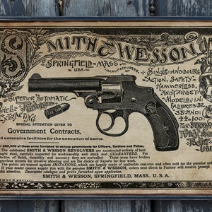 Distressed wooden reproduction sign &#39; Hammerless Revolver &#39;