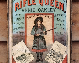 Distressed wooden sign 'Rifle Queen' reproduction.